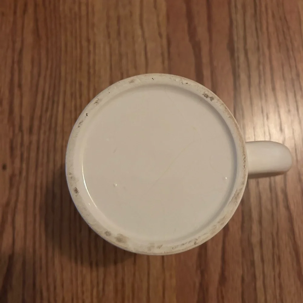 White Ceramic Christmas Tree Mug. Changes colors when filled w/hot liquid.